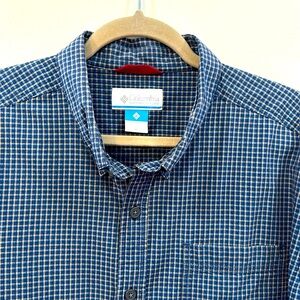 Columbia blue and gold plaid.  100% Cotton Size XL